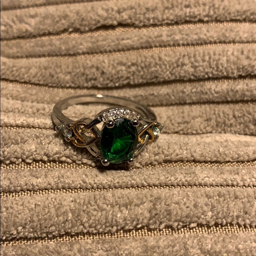 Beautiful large emerald oval shaped diamond accent